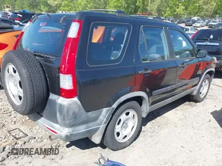 2006 Honda CR-V LX with VIN JHLRD68586C009537, listed as a IAAI auction lot 42029852 with 160,311 mi miles and . Bid and sale history available at DreamBid. Image 4.