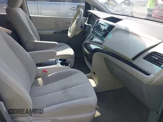 2013 Toyota Sienna LE AAS with VIN 5TDKK3DC2DS389557, listed as a IAAI auction lot 42589108 with 205,115 mi miles and . Bid and sale history available at DreamBid. Image 5.