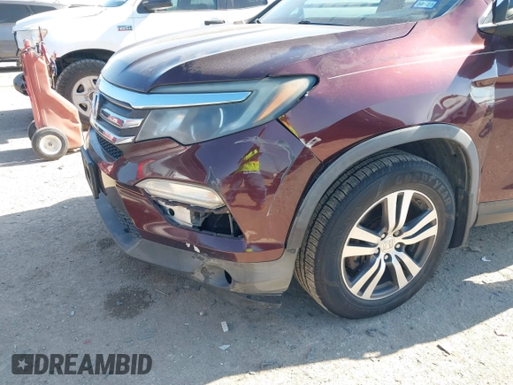 2016 Honda Pilot EX-L with VIN 5FNYF5H58GB026209, listed as a IAAI auction lot 41333088 with 129,484 mi miles and . Bid and sale history available at DreamBid. Image 17.