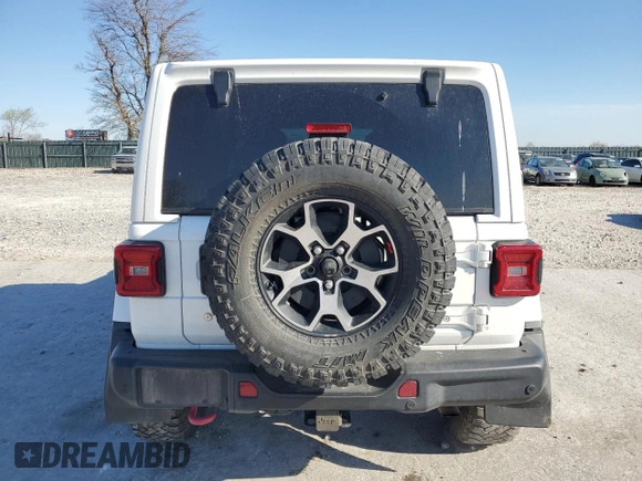 2018 Jeep Wrangler Unlimited Rubicon с VIN 1C4HJXFGXJW210780, выставлен на аукционе Copart как лот 50590655 с пробегом 98 416 миль миль и Списание • Salvage title. История ставок и продаж доступна на DreamBid. Изображение 6.