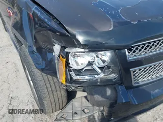 2013 Chevrolet Suburban LT with VIN 1GNSCJE07DR147780, listed as a IAAI auction lot 41666746 with 260,020 mi miles and . Bid and sale history available at DreamBid. Image 6.