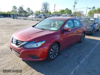 2016 Nissan Altima 2.5 SL with VIN 1N4AL3AP8GC147545, listed as a IAAI auction lot 41892714 with 70,991 mi miles. Bid and sale history available at carsss.com. Image 2.