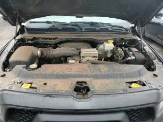 2023 Ram 1500 Rebel z VIN 1C6SRFLT9PN542449, wystawiony jako Copart lot #84629705 z przebiegiem 37 063 mil mil oraz Czysty tytuł • Clean title. Historia ofert i sprzedaży dostępna na DreamBid. Obrazek 14.