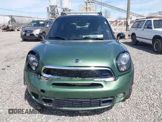 2015 MINI Paceman S z VIN WMWSS7C56FWS44788, wystawiony jako IAAI lot #41835683 z przebiegiem 101 432 mil mil oraz . Historia ofert i sprzedaży dostępna na DreamBid. Obrazek 12.