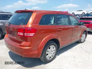 2014 Dodge Journey American Value Pkg with VIN 3C4PDCAB6ET248820, listed as a IAAI auction lot 39159166 with 215,007 mi miles. Bid and sale history available at carsss.com. Image 4.