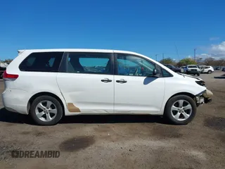 2012 Toyota Sienna with VIN 5TDZK3DC7CS203993, listed as a IAAI auction lot 41130289 with 177,059 mi miles. Bid and sale history available at carsss.com. Image 14.