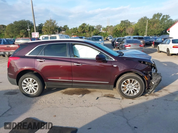 2018 Cadillac XT5 FWD with VIN 1GYKNARS6JZ179706, listed as a IAAI auction lot 41195570 with 80,676 mi miles. Bid and sale history available at carsss.com. Image 14.