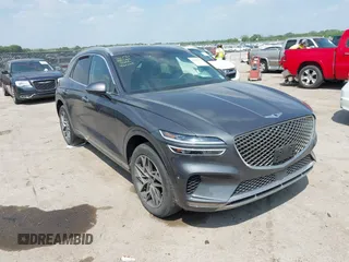 2023 Genesis GV70 2.5T with VIN KMUMADTB9PU084936, listed as a IAAI auction lot 42040232 with 28,201 mi miles and . Bid and sale history available at DreamBid. Image 1.