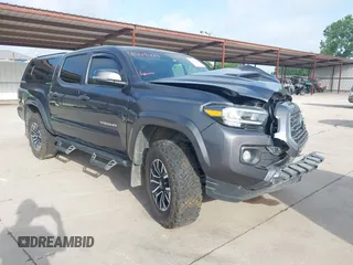 2023 Toyota Tacoma SR with VIN 3TMCZ5AN2PM599209, listed as a IAAI auction lot 42449447 with 46,197 mi miles and . Bid and sale history available at DreamBid. Image 1.