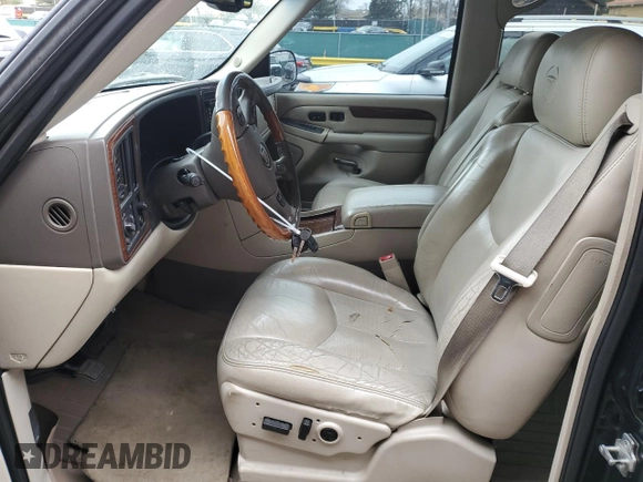 2004 Cadillac Escalade z VIN 1GYEK63N74R232309, wystawiony jako Copart lot #53099795 z przebiegiem 222 698 mil mil oraz Szkoda całkowita • Salvage title. Historia ofert i sprzedaży dostępna na DreamBid. Obrazek 7.