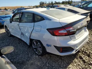 2021 Honda Clarity Plug-In Hybrid with VIN JHMZC5F1XMC001588, listed as a Copart auction lot 68252414 with 72,339 mi miles and Salvage Title. Bid and sale history available at carsss.com. Image 2.