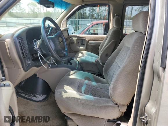 2002 GMC Savana z VIN 1GDFG65R221108418, wystawiony jako Copart lot #51793385 z przebiegiem 150 466 mil mil oraz Szkoda całkowita • Salvage title. Historia ofert i sprzedaży dostępna na DreamBid. Obrazek 7.