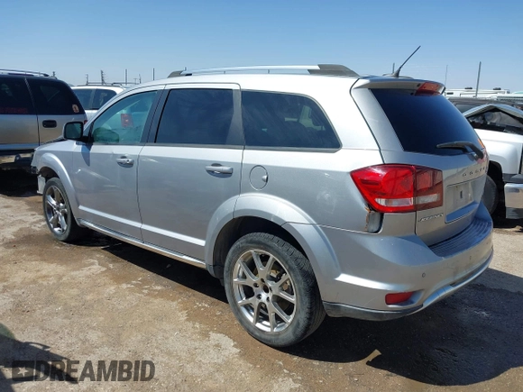 2015 Dodge Journey Crossroad with VIN 3C4PDCGB2FT692057, listed as a IAAI auction lot 41992747 with 94,212 mi miles and . Bid and sale history available at DreamBid. Image 3.