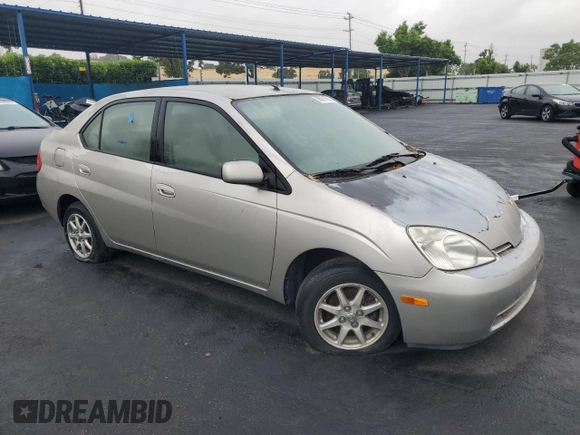 2003 Toyota Prius z VIN JT2BK18U430088533, wystawiony jako Copart lot #56091295 z przebiegiem 112 210 mil mil oraz Czysty tytuł • Clean title. Historia ofert i sprzedaży dostępna na DreamBid. Obrazek 4.