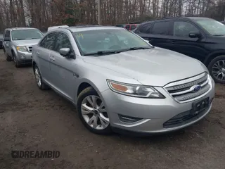 2011 Ford Taurus SEL z VIN 1FAHP2EW2BG171677, wystawiony jako IAAI lot #41145894 z przebiegiem 103 511 mil mil oraz . Historia ofert i sprzedaży dostępna na DreamBid. Obrazek 1.