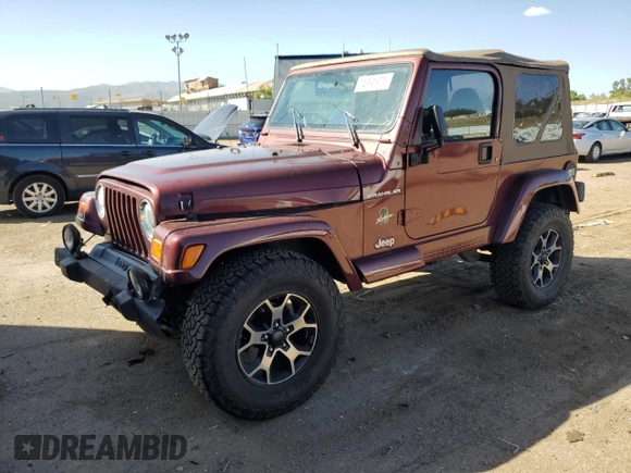 2002 Jeep Wrangler Sahara with VIN 1J4FA59S92P708647, listed as a Copart auction lot 74851654 with 131,794 mi miles and Salvage Title. Bid and sale history available at carsss.com. Image 1.