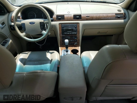 2005 Ford Five Hundred SEL with VIN 1FAFP24165G104114, listed as a Copart auction lot 60530235 with Not provided miles and Salvage title. Bid and sale history available at DreamBid. Image 8.