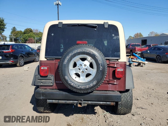 2002 Jeep Wrangler Sahara with VIN 1J4FA59S22P704603, listed as a Copart auction lot 77554334 with 99,758 mi miles and Salvage Title. Bid and sale history available at carsss.com. Image 6.