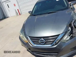2016 Nissan Altima S z VIN 1N4AL3AP6GC228463, wystawiony jako IAAI lot #42032010 z przebiegiem 159 999 mil mil oraz . Historia ofert i sprzedaży dostępna na DreamBid. Obrazek 13.