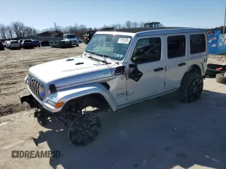 2024 Jeep Wrangler Sahara with VIN 1C4RJXP63RW195206, listed as a Copart auction lot 48784595 with 10,737 mi miles and Salvage Title. Bid and sale history available at DreamBid. Image 1.