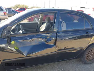 2004 Toyota Corolla CE with VIN JTDBR32E142041255, listed as a IAAI auction lot 41807159 with 211,905 mi miles and . Bid and sale history available at DreamBid. Image 6.