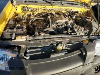 2004 Nissan Frontier XE z VIN 1N6ED27T34C449972, wystawiony jako Copart lot #87205714 z przebiegiem 254 636 mil mil oraz Szkoda całkowita • Salvage title. Historia ofert i sprzedaży dostępna na DreamBid. Obrazek 11.