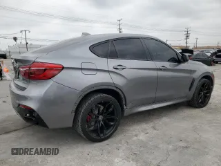 2018 BMW X6 sDrive35i with VIN 5UXKU0C52J0G81057, listed as a Copart auction lot 50698205 with 67,735 mi miles and Salvage Title. Bid and sale history available at carsss.com. Image 3.