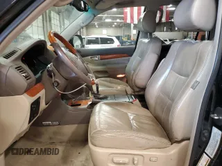 2004 Lexus GX 470 with VIN JTJBT20X740025411, listed as a Copart auction lot 55363145 with 329,164 mi miles and Salvage Title. Bid and sale history available at DreamBid. Image 7.