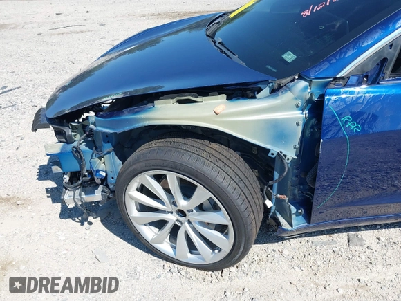 2019 Tesla Model 3 Mid Range with VIN 5YJ3E1EA6KF402308, listed as a IAAI auction lot 40077902 with 89,794 mi miles and . Bid and sale history available at carsss.com. Image 6.