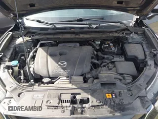 2014 Mazda CX-5 Touring with VIN JM3KE2CY9E0333951, listed as a IAAI auction lot 41825345 with 124,684 mi miles. Bid and sale history available at carsss.com. Image 10.