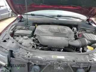 2018 Jeep Grand Cherokee Sterling z VIN 1C4RJFBG3JC344245, wystawiony jako Copart lot #58357395 z przebiegiem 99 639 mil mil oraz Czysty tytuł • Clean title. Historia ofert i sprzedaży dostępna na DreamBid. Obrazek 14.