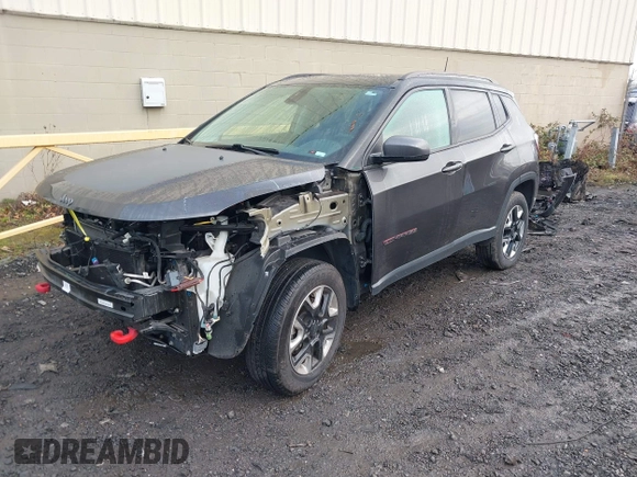 2017 Jeep Compass Trailhawk with VIN 3C4NJDDB9HT657173, listed as a IAAI auction lot 41613348 with 60,781 mi miles and . Bid and sale history available at DreamBid. Image 18.