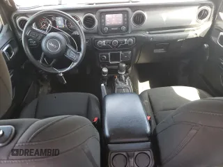 2021 Jeep Gladiator Freedom с VIN 1C6HJTAG4ML580023, выставлен на аукционе Copart как лот 57586475 с пробегом 64 022 миль миль и Списание • Salvage title. История ставок и продаж доступна на DreamBid. Изображение 8.