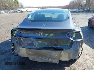 2022 Tesla Model 3 Long Range with VIN 5YJ3E1EB0NF365284, listed as a IAAI auction lot 41899706 with 36,463 mi miles and . Bid and sale history available at DreamBid. Image 17.