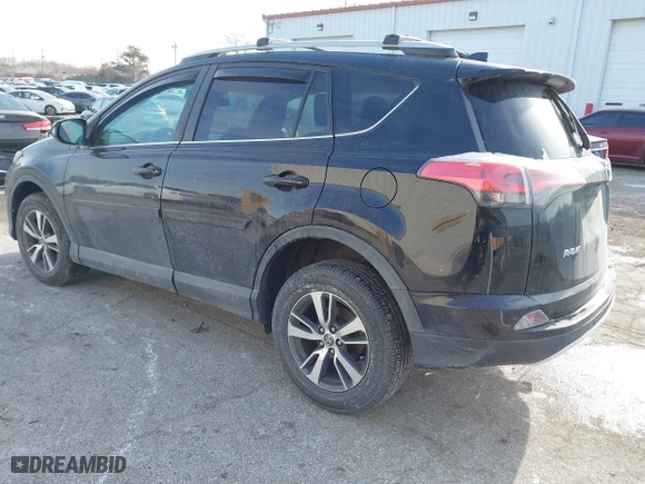 2016 Toyota RAV4 XLE with VIN 2T3WFREV7GW255784, listed as a IAAI auction lot 41266085 with 87,426 mi miles. Bid and sale history available at carsss.com. Image 3.