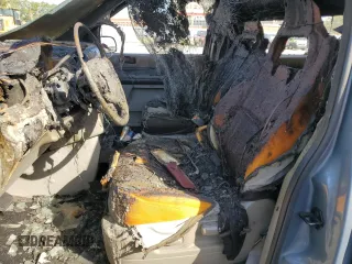 2004 Ford Freestar SE z VIN 2FMZA51674BB22374, wystawiony jako Copart lot #57065105 z przebiegiem Nie podano mil oraz Szkoda całkowita • Salvage title. Historia ofert i sprzedaży dostępna na DreamBid. Obrazek 7.