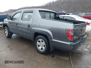 2012 Honda Ridgeline RT with VIN 5FPYK1F24CB456298, listed as a IAAI auction lot 40869948 with 123,329 mi miles and . Bid and sale history available at DreamBid. Image 3.