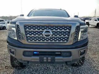 2017 Nissan Titan Platinum Reserve with VIN 1N6BA1F43HN568650, listed as a Copart auction lot 59593525 with 126,193 mi miles and Salvage title. Bid and sale history available at DreamBid. Image 5.
