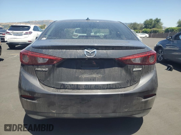 2014 Mazda 3 S Touring with VIN JM1BM1V39E1145478, listed as a Copart auction lot 57860645 with 55,322 mi miles and Salvage title. Bid and sale history available at DreamBid. Image 6.