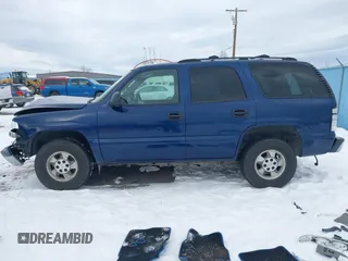2002 Chevrolet Tahoe LS with VIN 1GNEK13V12J330179, listed as a IAAI auction lot 41382530 with 216,051 mi miles and . Bid and sale history available at DreamBid. Image 15.