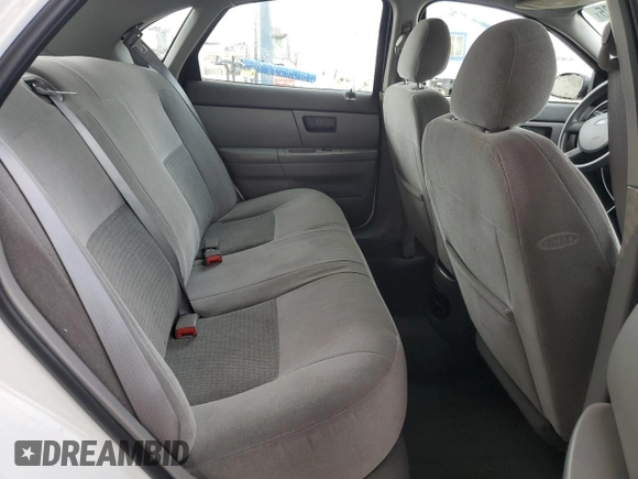 2006 Ford Taurus SE with VIN 1FAHP53U86A237001, listed as a Copart auction lot 62858785 with 133,697 mi miles and Salvage title. Bid and sale history available at DreamBid. Image 10.
