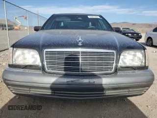 1995 Mercedes-Benz S with VIN WDBGA43E9SA233994, listed as a Copart auction lot 65867264 with 655,674 mi miles and Salvage Title. Bid and sale history available at DreamBid. Image 5.