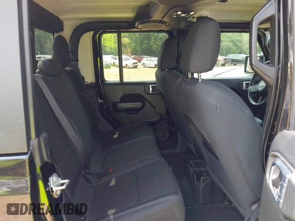 2021 Jeep Gladiator Willys with VIN 1C6HJTAG7ML514114, listed as a IAAI auction lot 42399793 with 78,829 mi miles and . Bid and sale history available at DreamBid. Image 8.