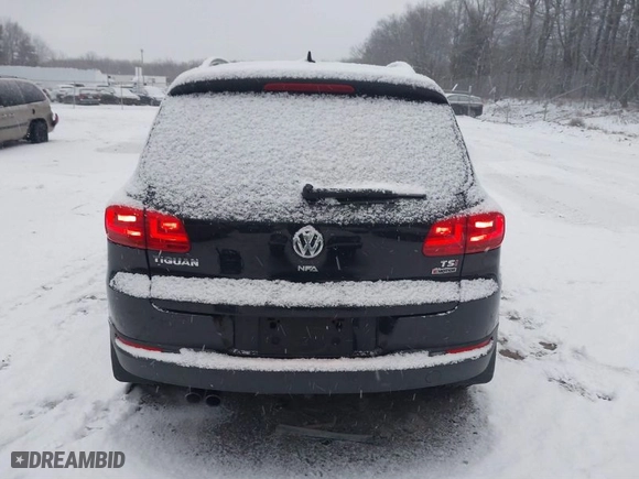 2017 Volkswagen Tiguan Wolfsburg Edition with VIN WVGSV7AX7HK001544, listed as a IAAI auction lot 41295578 with 81,950 mi miles. Bid and sale history available at carsss.com. Image 16.