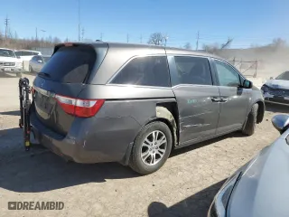 2012 Honda Odyssey EX-L with VIN 5FNRL5H64CB127540, listed as a Copart auction lot 46901695 with 90,616 mi miles and Salvage Title. Bid and sale history available at carsss.com. Image 3.