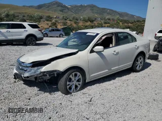 2012 Ford Fusion SE with VIN 3FAHP0HA2CR182256, listed as a Copart auction lot 57123785 with 153,988 mi miles and Salvage title. Bid and sale history available at DreamBid. Image 1.