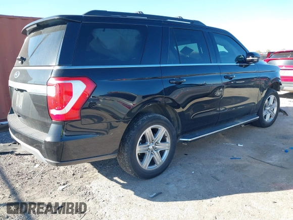 2019 Ford Expedition XLT with VIN 1FMJU1HT3KEA73359, listed as a IAAI auction lot 40979883 with 75,295 mi miles. Bid and sale history available at carsss.com. Image 4.