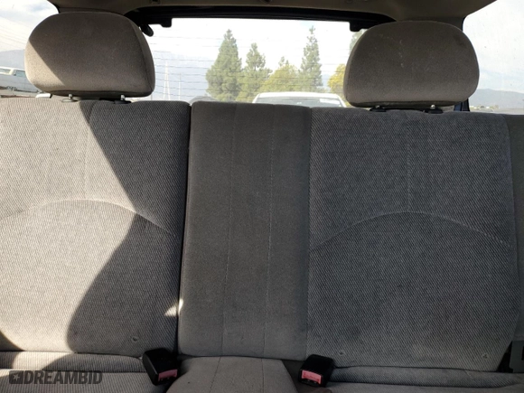 2001 Mazda Tribute LX with VIN 4F2YU09151KM38909, listed as a Copart auction lot 77808264 with 136,005 mi miles and Salvage Title. Bid and sale history available at carsss.com. Image 10.