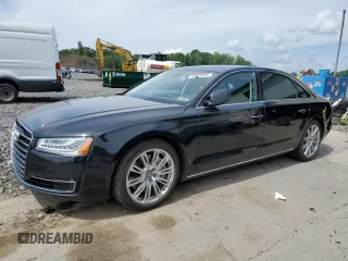 2015 Audi A8 3.0T with VIN WAU3GAFD0FN036465, listed as a Copart auction lot 64069035 with 100,149 mi miles and Salvage title. Bid and sale history available at DreamBid. Image 1.