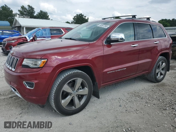 2015 Jeep Grand Cherokee Overland with VIN 1C4RJECG2FC823353, listed as a Copart auction lot 58367395 with 72,117 mi miles and Salvage title. Bid and sale history available at DreamBid. Image 1.